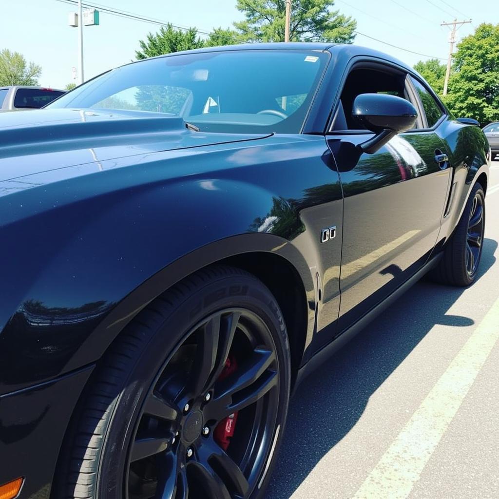 A car gleaming after professional detailing in Grand Rapids