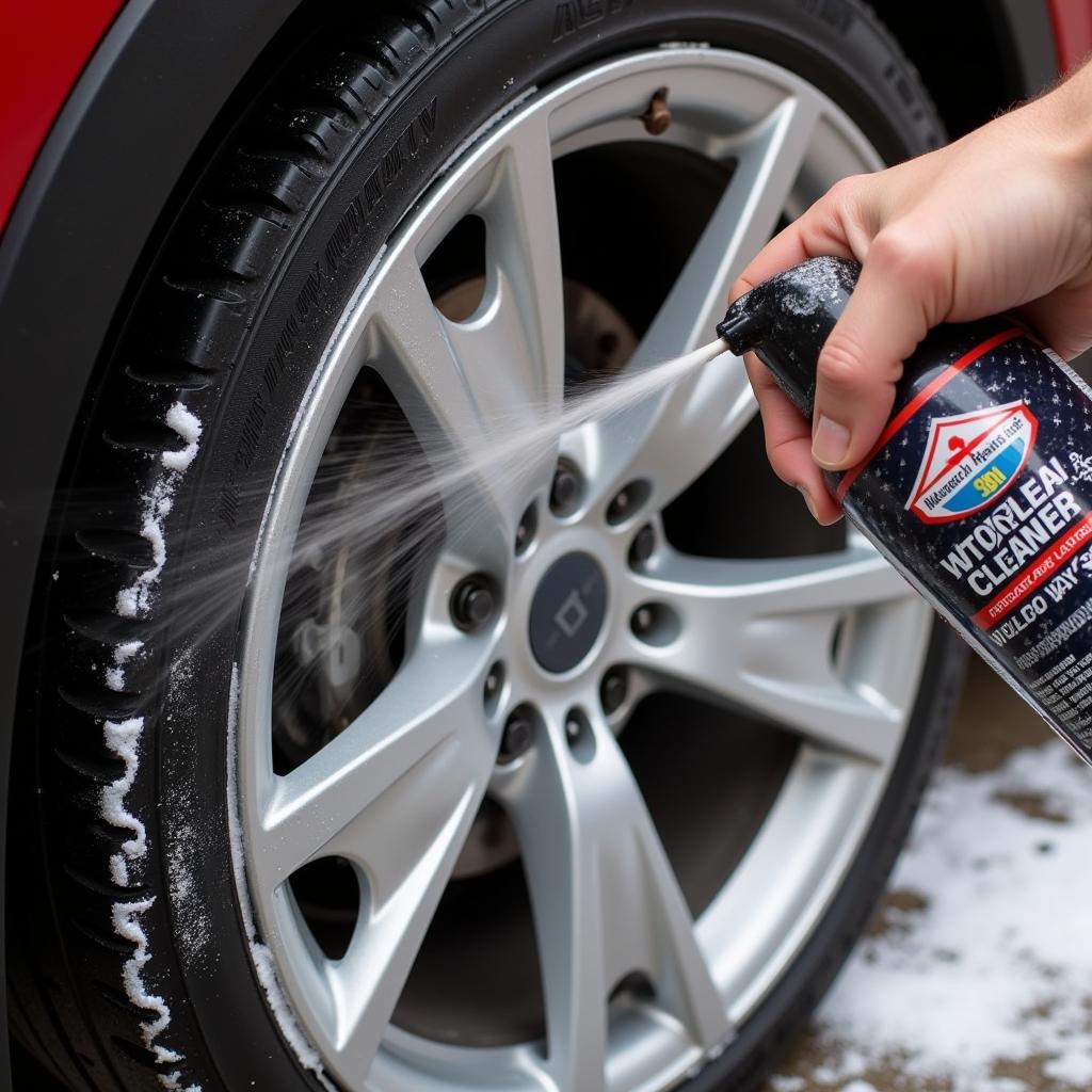 Car Wheel Being Cleaned With Specialized Cleaner