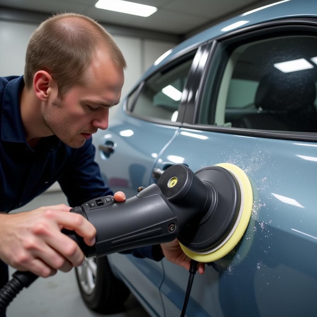 Close-up of car paint correction