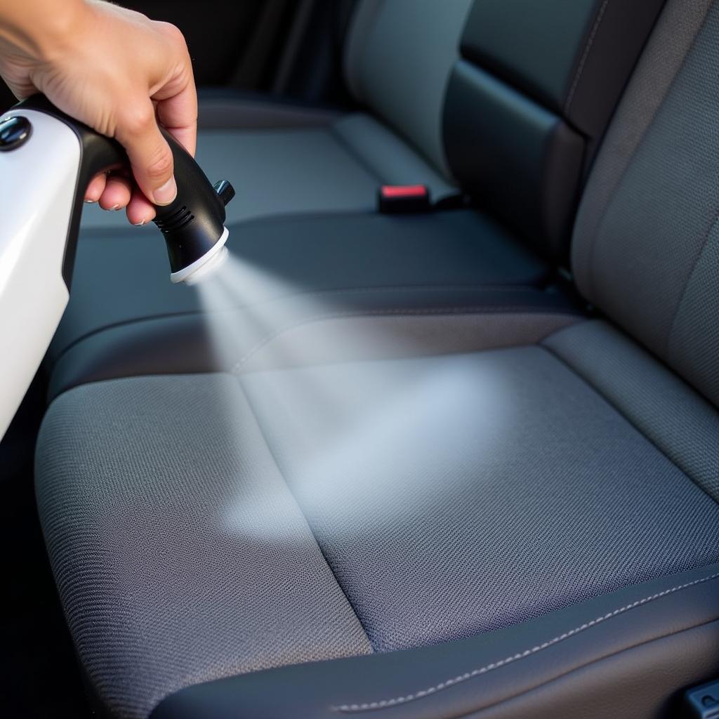 Car detail upholstery steamer cleaning car seats