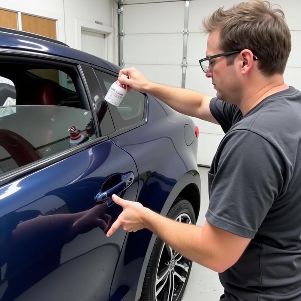 Applying ceramic coating on a car in McMinnville OR