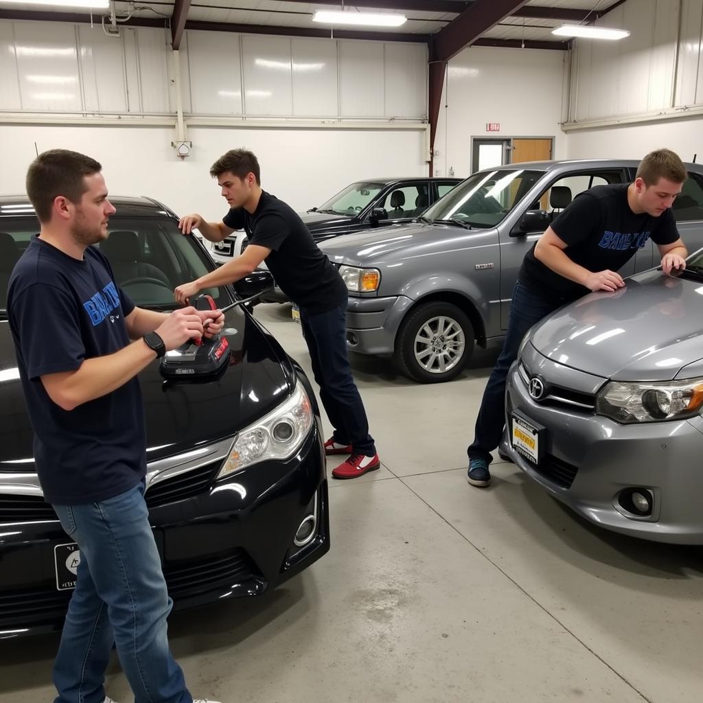 Students Practicing Car Detailing Techniques in Michigan