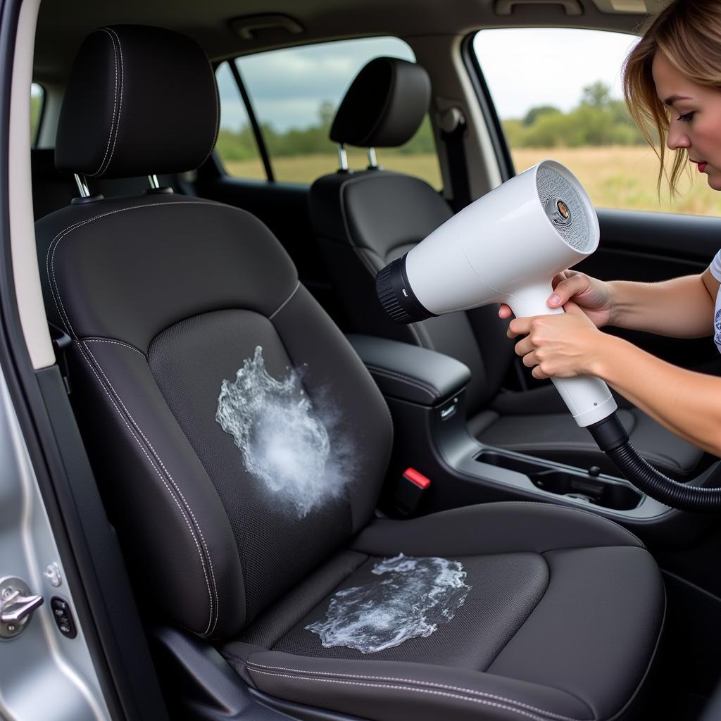 Using a tornado gun to clean car seats and remove stains