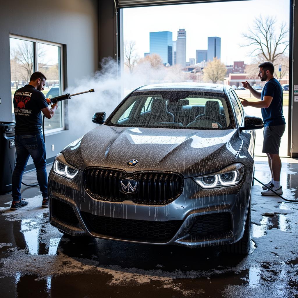 Exterior car wash at a Denver detailing shop