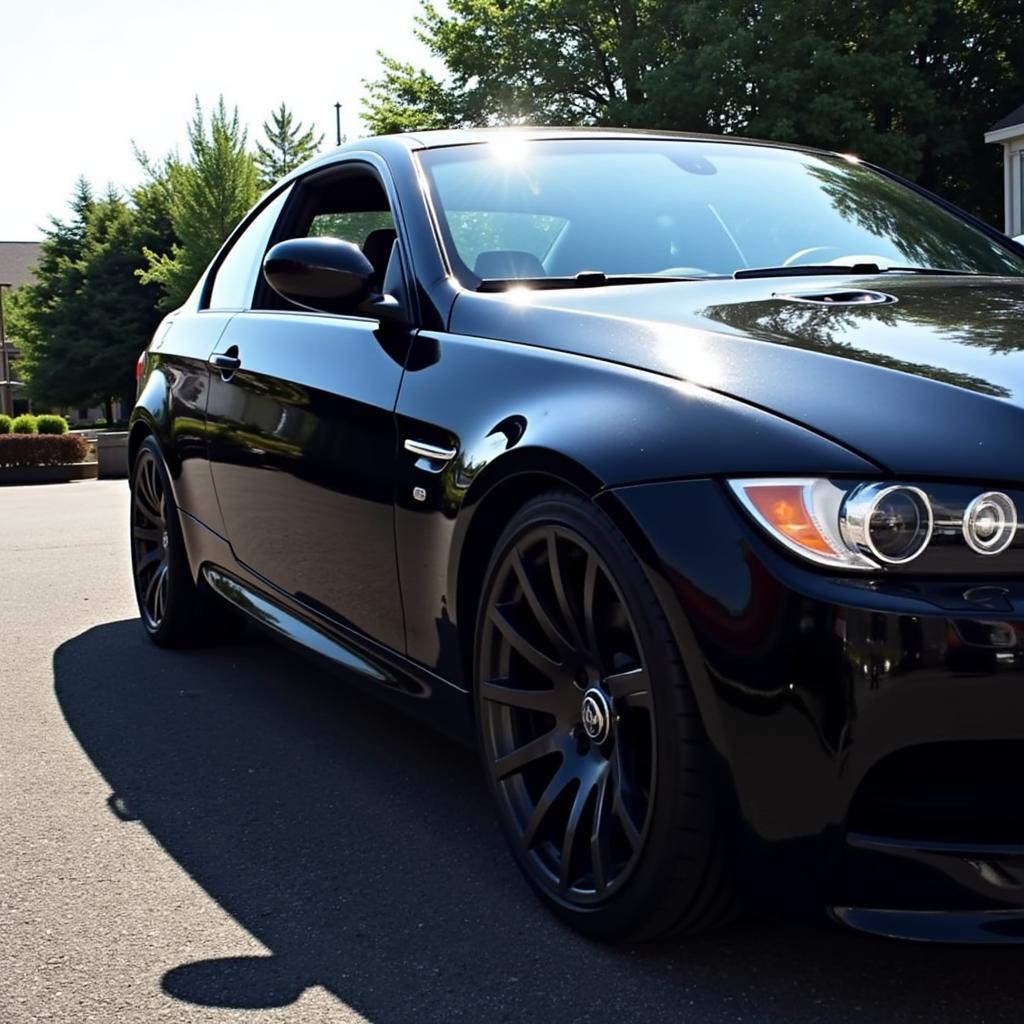 A Pristine, Detailed Black Car Gleaming in the Sun