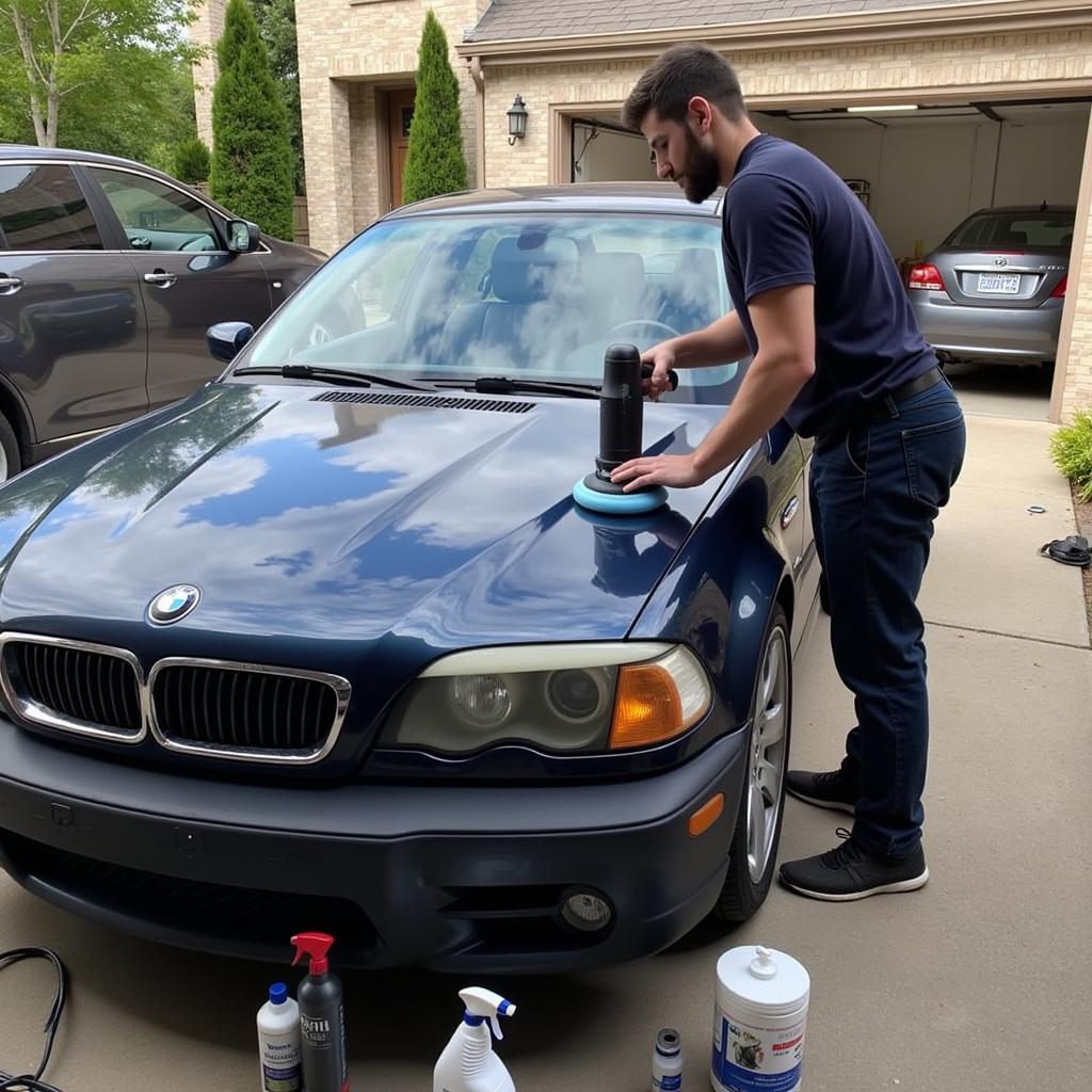 Mobile Detailer Working on a Car