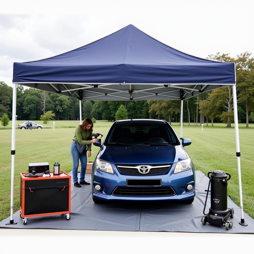 Car Detailing Setup Under a Pop Up Canopy