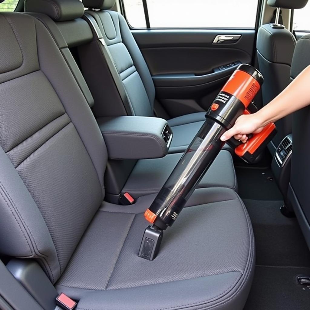 Vacuuming car interior for deep cleaning