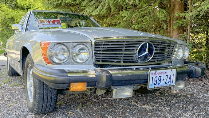 1975 Mercedes-Benz 450 SL front view showcasing its iconic star emblem and chrome bumper