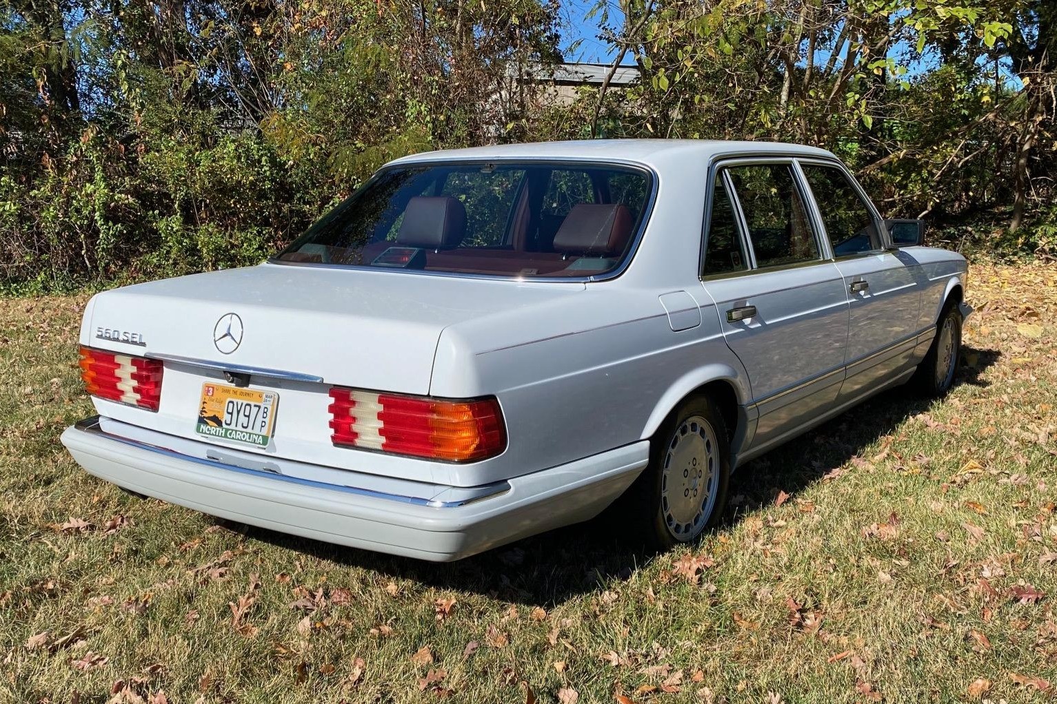 Arctic White 1989 Mercedes-Benz 560SEL Side View