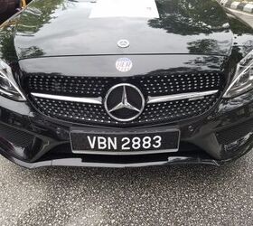 2018 Mercedes-Benz C43 AMG: Front view showcasing its sporty design and AMG styling cues