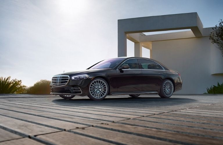 Luxury maroon Mercedes-Benz S-Class sedan showcasing elegant design, similar to the 2016 S550 for sale.