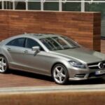 Side profile of a 2013 Mercedes-Benz CLS-Class, showcasing its coupe-like roofline.