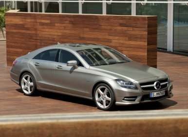 Side profile of a silver 2013 Mercedes-Benz CLS-Class showcasing its coupe-like roofline