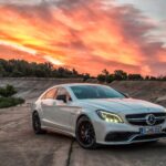 Interior view of the 2018 Mercedes-AMG CLS 63 S, highlighting the luxurious leather seats, dashboard, and cabin design.