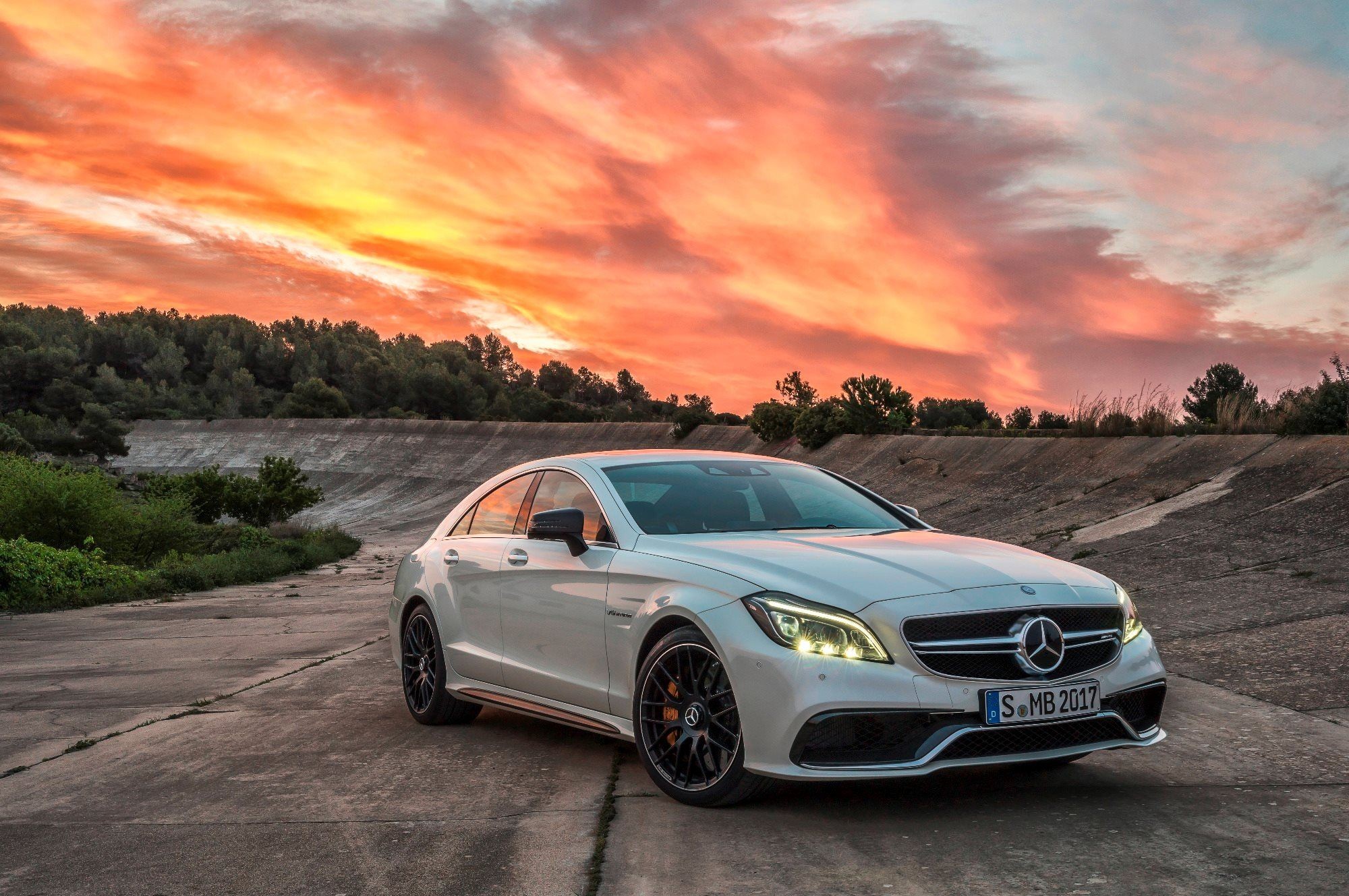 Interior view of the 2018 Mercedes-AMG CLS 63 S, highlighting the luxurious leather seats, dashboard, and cabin design.