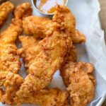 Crispy chicken tenders at West Nest by Westside Works concession stand inside Mercedes-Benz Stadium