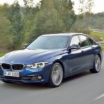 Front angle view of a 2016 BMW 3-Series, showcasing its iconic kidney grille and headlights