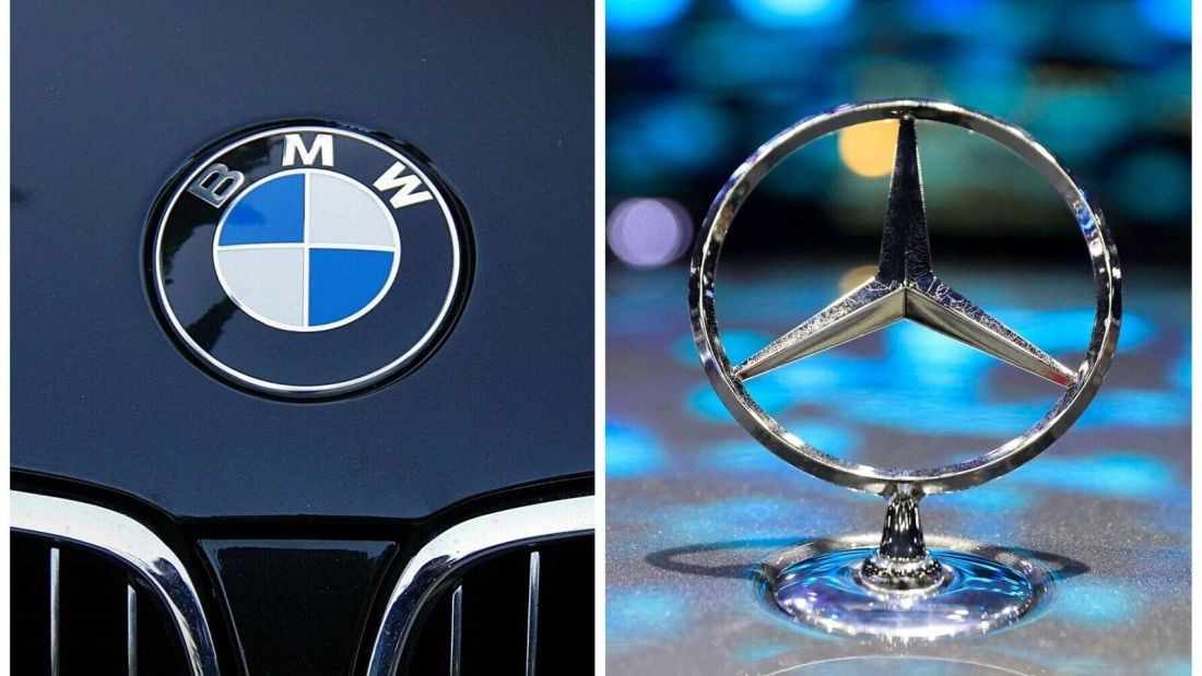 Mercedes-Benz and BMW logos side-by-side representing the luxury car brand comparison