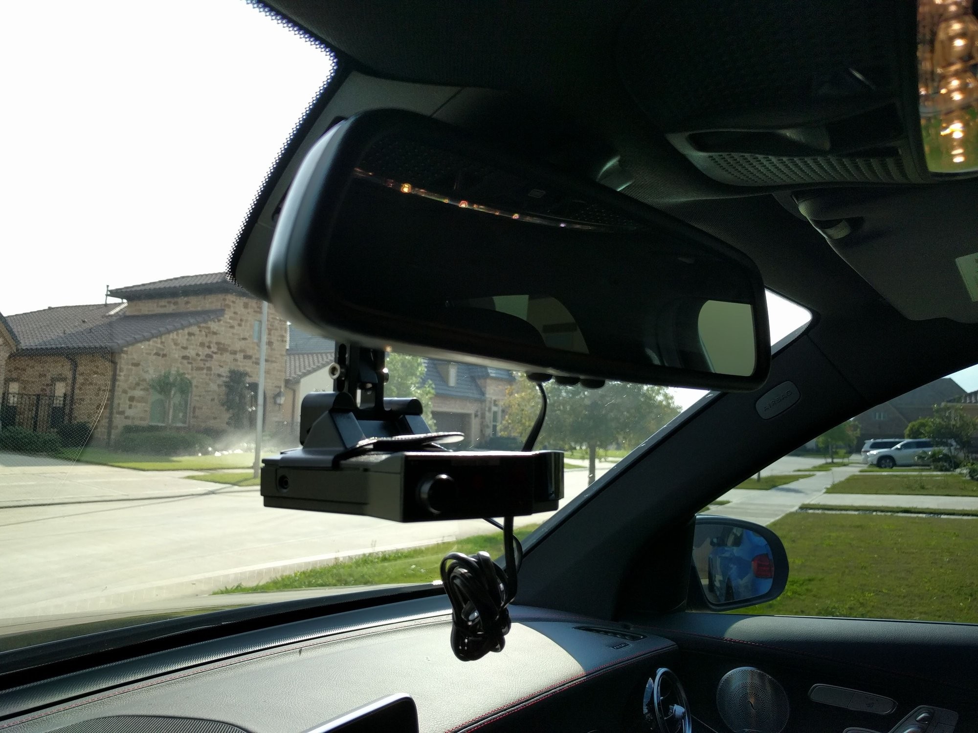 Mercedes GLC 43 AMG Coupe radar detector installation tools laid out, including credit card, wedge tool, and allen wrench