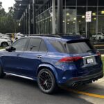 Mercedes GLE 63 S AMG parked outdoors, showcasing its sporty SUV design, suitable for a blog post about luxury car ownership and potential CarMax trade-in considerations.