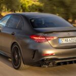 Mercedes-AMG C63S E Performance in Silver, showcasing its sporty design. The new C63S, despite its powerful hybrid engine, faces sales challenges.