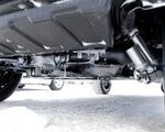 Mercedes-Benz EQG suspension system detail, showcasing robust off-road engineering in spy photos.