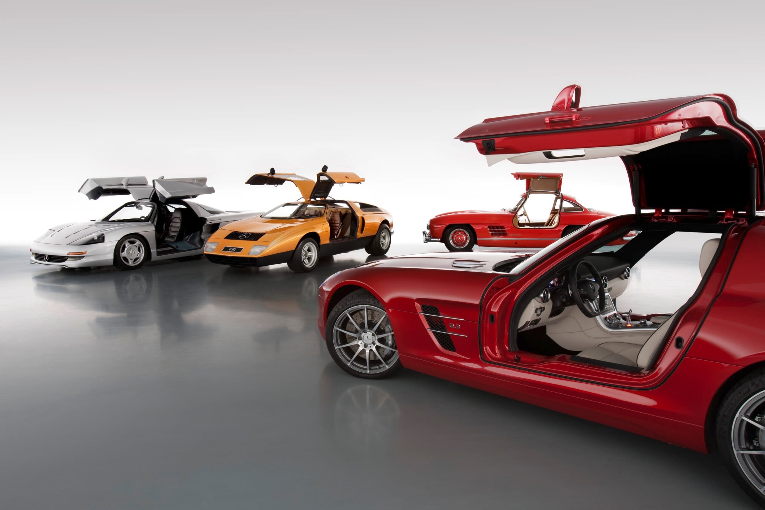 Mercedes-Benz Gullwing Family showcasing iconic door design.