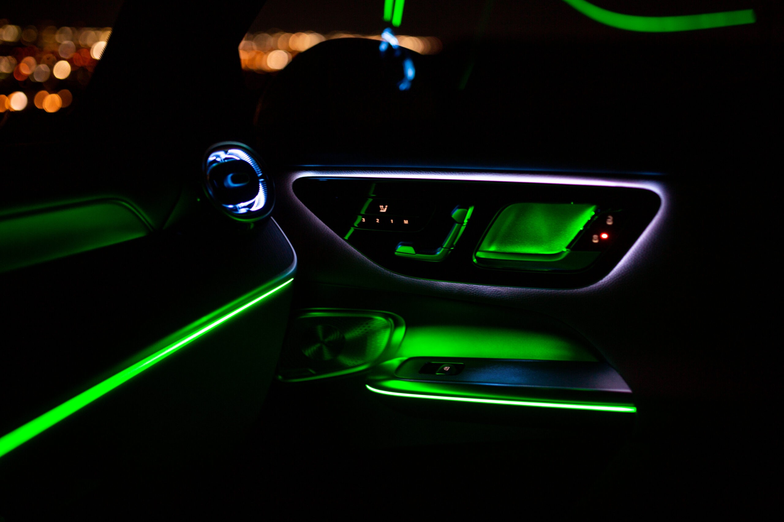 Mercedes GLC 300 close-up of the steering wheel controls and digital instrument cluster highlighting the modern tech integration