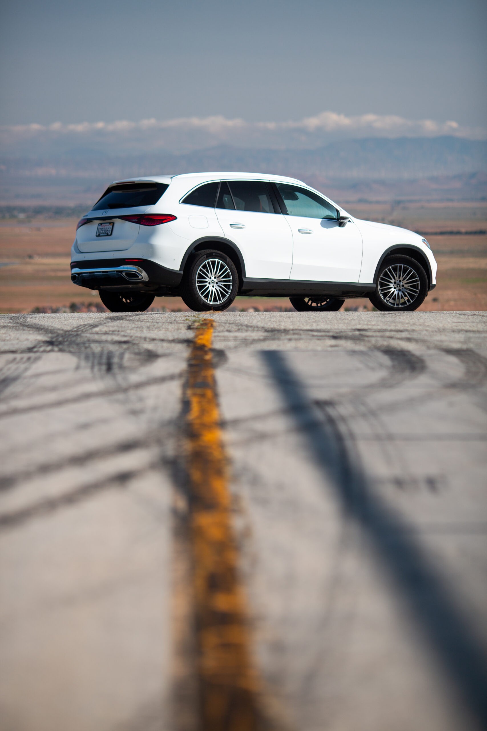 Mercedes GLC 300 in motion on a paved road demonstrating its on-road driving capabilities