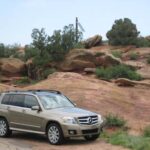 Side profile of a 2010 Mercedes-Benz GLK 350, showcasing its boxy design - ideal for detailing and paint correction to restore shine.