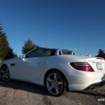 Front three quarter view of the stylish 2012 Mercedes SLK350 convertible showcasing its sporty design.