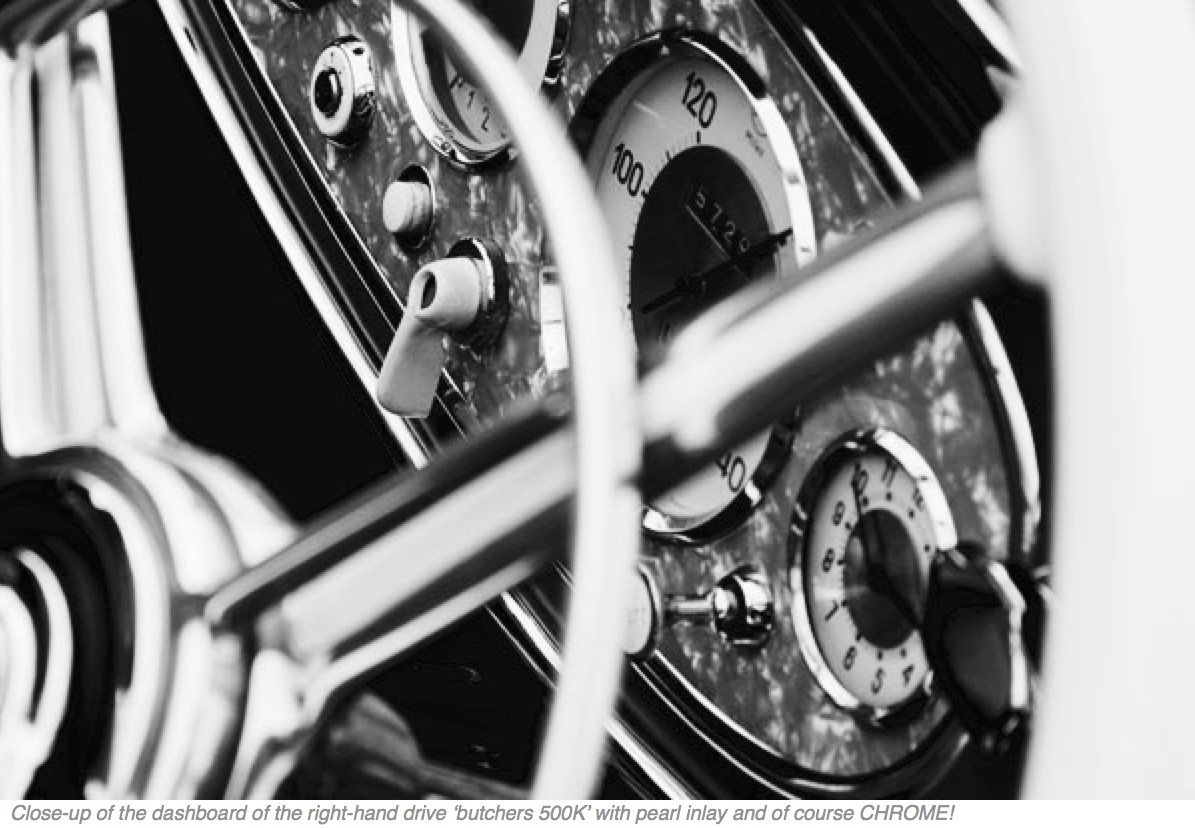 Front three quarter view of a classic Mercedes-Benz 500K Spezial Roadster in silver, showcasing its elegant long hood and right-hand drive configuration.