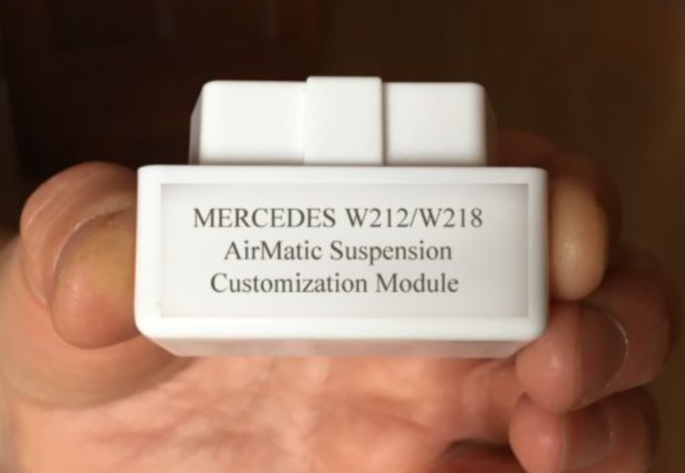 Compact OBD lowering module made in Germany, easily connects to Mercedes OBDII port